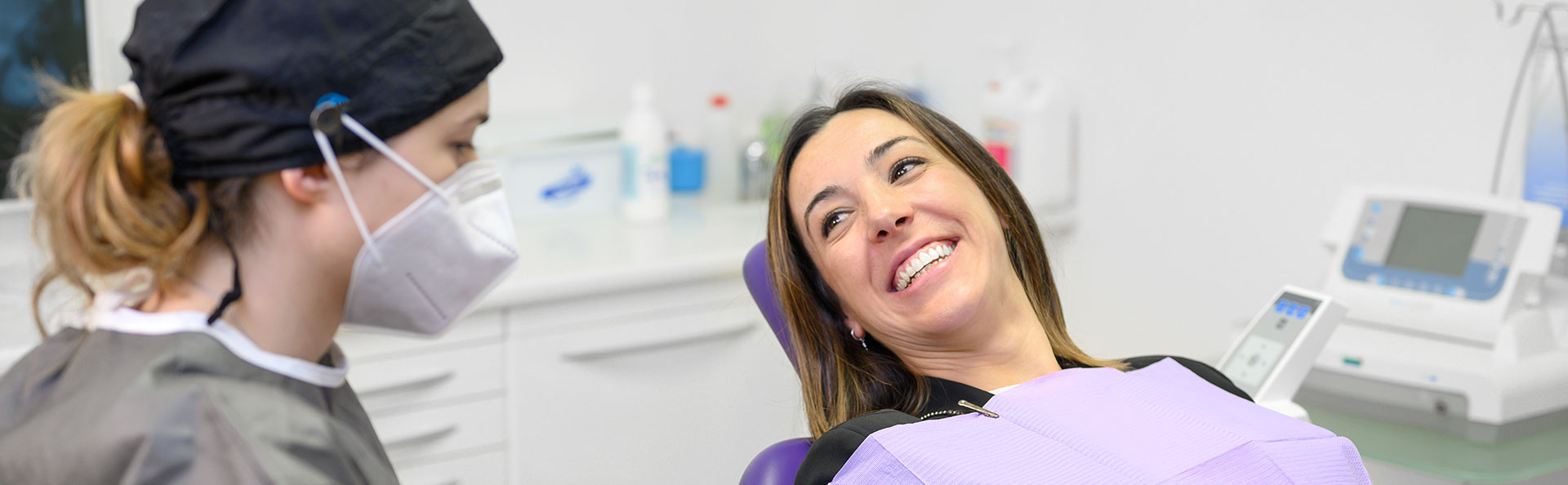 Beautiful woman smiling after root canal treatments