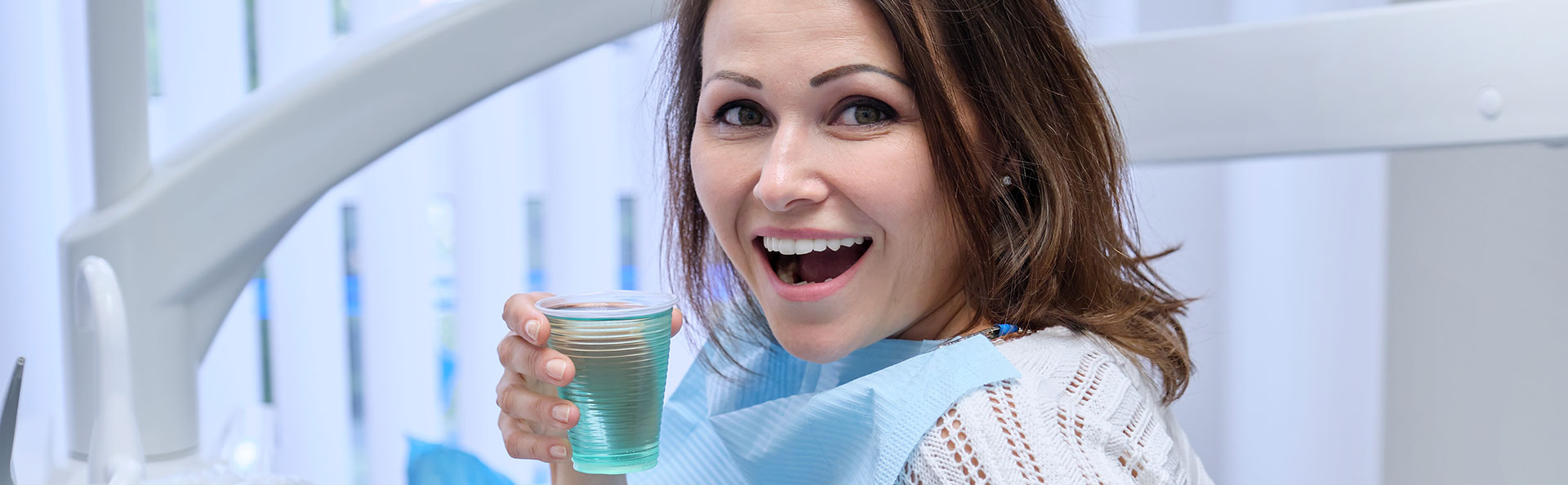 Beautiful woman smiling after oral hygiene maintenance